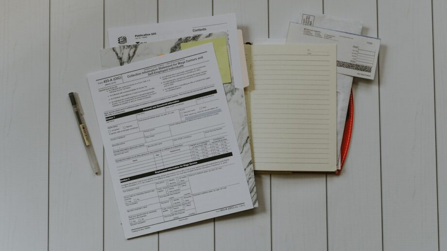 stack of papers flat lay photography