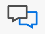 Two overlapping speech bubble icons, one black and one blue, on a plain white background.